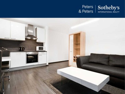 Hochwertig ausgestattete 2- Zimmerwohnung mit großer Terrasse