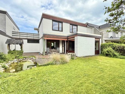 Zeitlos schönes Reihenhaus im Bauhausstil mit 2 Terrassen & schönem Garten in guter Lage