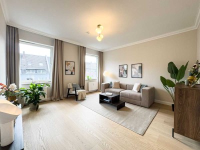 Exklusives Wohnen im Düsseldorfer Zooviertel – Stilvoll sanierte Altbauwohnung mit Balkon ins Grüne