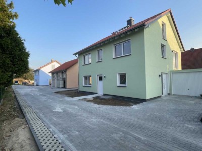 = H = NEUBAU! FREISTEHENDES EINFAMILIENHAUS MIT WÄRMEPUMPE, GARAGE IN GEFRAGTER WOHNLAGE! = H =