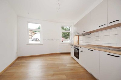 Gemütliche 3-Raum-Wohnung mit neuer Einbauküche und schönem Gemeinschaftsgarten