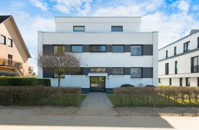 Energieeffiziente EG-Wohnung mit großer Südterrasse, Garten und TG-Stellplatz