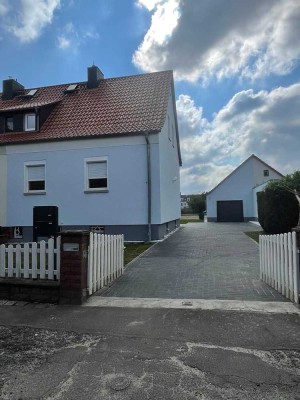 Doppelhaushälfte mit Terrasse + Garage + PKW Stellplätze + Garten in Leipzig-Portitz