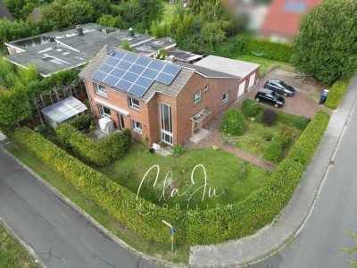 Provisionsfrei - Einfamilienhaus mit Einliegerwohnung / Zweifamilienhaus, Garagen und Photovoltaikan