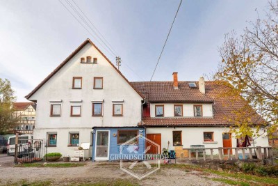 Kapitalanlage mit 6,5% Rendite: Geräumiges Wohnhaus mit großer Werkstatt und Garten