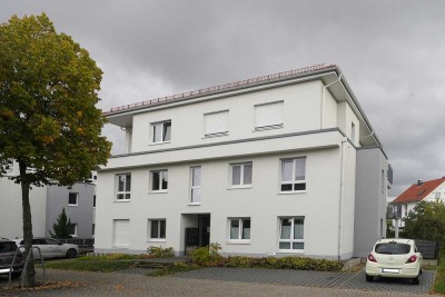 Neuwertige 4-Zi-Gartenwhng. mit ca. 110 m² Wfl., TG-Stellplatz+ EBK, barrierearm, zentrale Lage