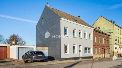 Modernisierte DHH mit Garage, Carport, Gartenhaus und Erweiterungspotential in ruhiger Lage