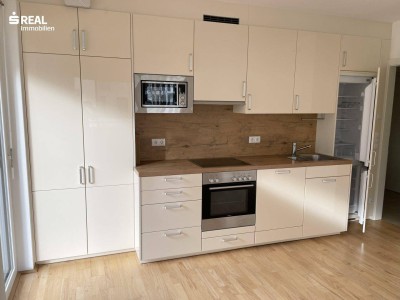 „Green City“/Neuwertige 4-Zimmer-Eckwohnung mit Südwest-Terrasse in Grünruhelage