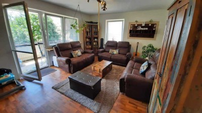 Attraktive 3-Zimmer-Wohnung mit Balkon und Gartenanteil