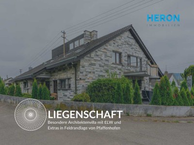 LIEGENSCHAFT - Besondere Architektenvilla mit ELW und Extras in Feldrandlage von Pfaffenhofen