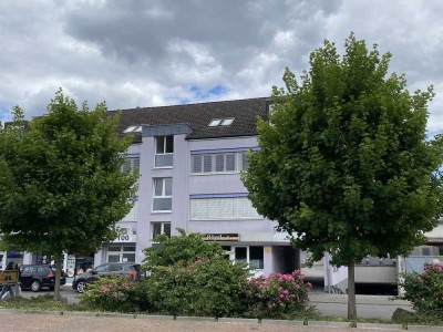 Attraktive Kapitalanlage! Vermietete Dachgeschosswohnung mit mehreren TG-Stellplätzen  in zentraler