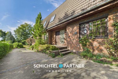 Worpswede | Exklusives Zweifamilienhaus mit großem Garten und zwei Garagen