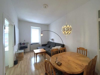 SCHWIND IMMOBILIEN - schöne Erdgeschosswohnung mit Balkon und kleinem Garten im Martinsviertel