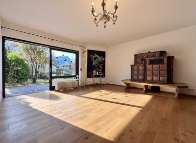 Zentrumsnahe Toplage im Grünen: EG-Wohnung mit Terrasse, Bergblick & großzügigem Hobbyraum