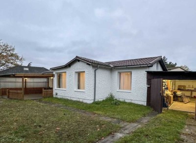 Vermieteter Bungalow auf großem Grundstück – 4% Rendite, 15.600 € Jahreskaltmiete