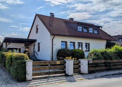 Zweifamilienhaus mit Terrasse und Wintergarten