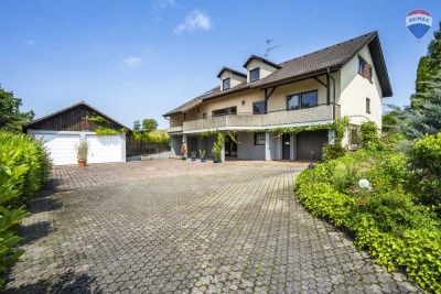 Charmantes Zweifamilienhaus mit Einliegerwohnung und großzügigem Gartenparadies