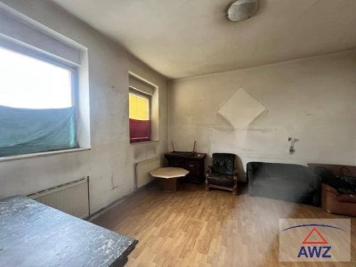 Haushälfte mit einer Wohnung und einen schönen Garten in Langenzersdorf!
