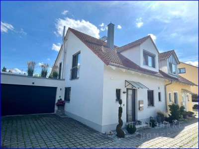 Exklusiv wohnen in Bestlage – hochwertige DHH mit PV, Garage & Top-Ausstattung