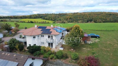 Wohnen mit Weitblick – Einfamilienhaus in traumhafter Hang- und Feldrandlage