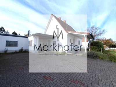 Charmantes Ein-/Zweifamilienhaus mit großem Grundstück und vielseitigen Nutzungsmöglichkeiten !