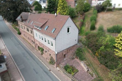 Ein-/Zweifamilienhaus mit separatem Garten und Garage in Derental