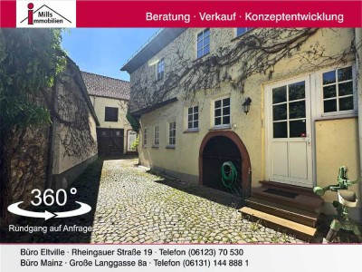 Historisches Zweifamilienhaus mit Scheune und sonnigem Garten in guter Lage