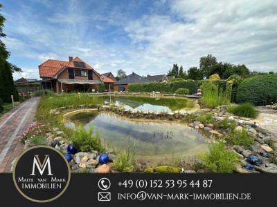 Einfamilienhaus mit großem Schwimmteich und Garten in Friedrichsfehn, optionales  Baugrundstück