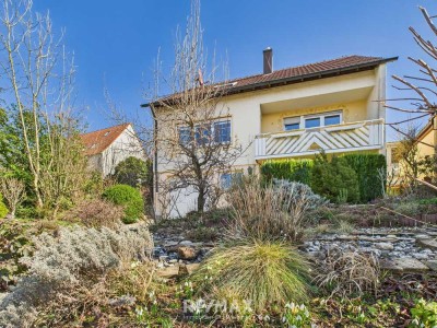 Platz für Generationen – Zweifamilienhaus mit Gartenparadies in Lichtenwald-Hegenlohe