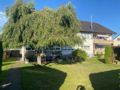 Charmante Dachgeschosswohnung in gepflegtem
Mehrfamilienhaus mit Balkon und Garage