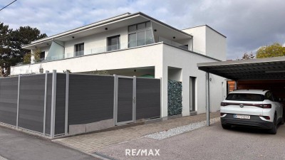 Exklusive Wohnung mit Garten und privatem Pool