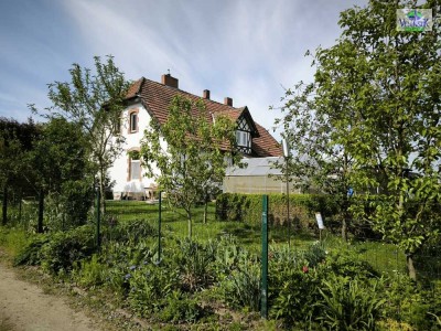 Ländliches Wohnen mit Charme – Historisches Einfamilienhaus in traumhafter Feldrandlage