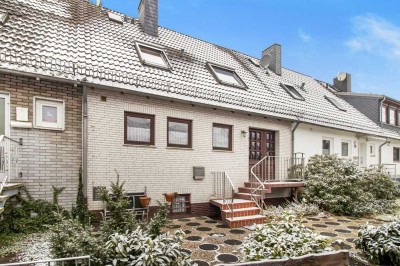 Bremen-Osterholz: Gepflegtes Reihenmittelhaus mit Vollkeller, Garage und großzügigem Grundstück