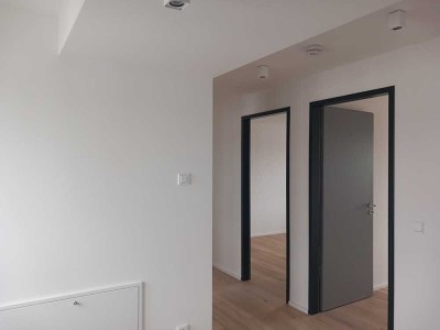 Lichtdurchflutete 2,5-Raumwohnung mit Dachterrasse