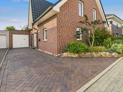 Zeitloser Klinkertraum – modernes Einfamilienhaus mit idyllischem Garten