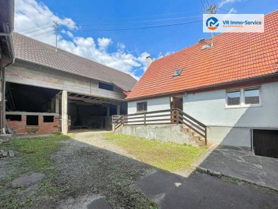 Viel Raum für Ideen – Einfamilienhaus mit großem Innenhof, Scheune und Nebengebäuden