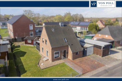 Modernisiertes Einfamilienhaus mit Wohnmobil-Carport und Nebengebäude