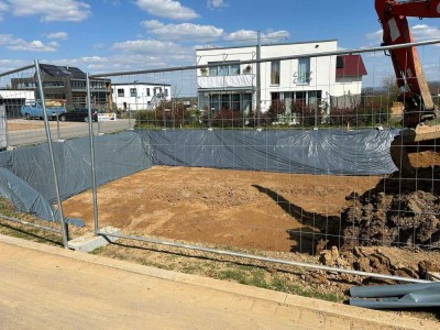 Obergeschosswohnung im kürzlich begonnenen Neubau! MFH mit Tiefgarage
