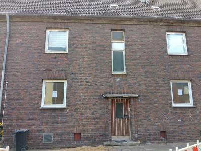 Mehrfamilienhaus renovierungsbedürftig