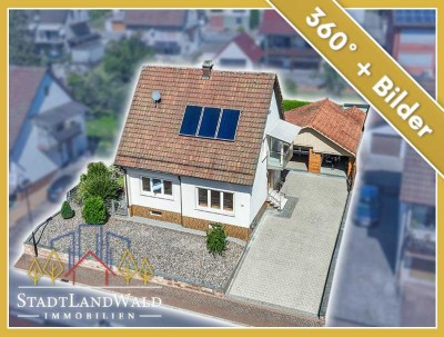 Sofort bezugsbereit! Attraktives EFH mit 2 Wohneinheiten, Garten, Terrasse und Garagen