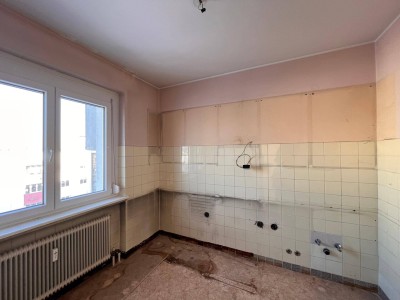 4-Zimmer-Eigentumswohnung - renovierungsbedürftig