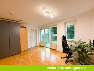 Zentral gelegene 1-Zimmer-Erdgeschosswohnung mit Garten und Tiefgarage