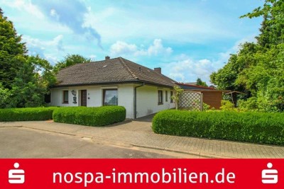 Ebenerdiges Wohnen in ruhiger Sackgassenendlage:  Modernisierungsbedürftiger Bungalow mit Garage!