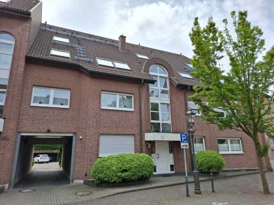 Neersen: Helle Erdgeschosswohnung mit Balkon und Garage