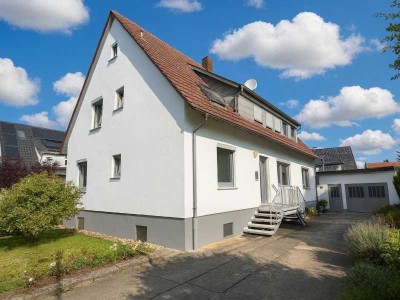 Ein Zuhause fürs Leben - Vielseitiges Zweifamilienhaus in familienfreundlicher Lage