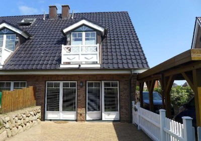 End-Hausteil mit SÜD-Terrasse, Carport und Gartenhaus in strandnaher, ruhiger Lage