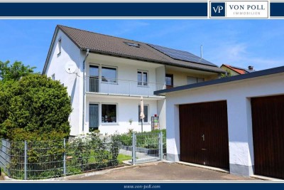 Doppelhaushälfte mit bis zu 
3 Wohnungen und 2 Garagen