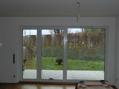 Lebensgefühl pur - Außergewöhnliche EG-Whg mit Terrasse, Gartenanteil und TG umgeben von Grünflächen