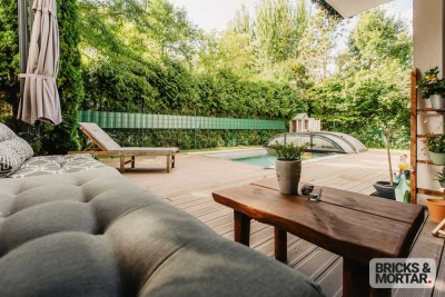 Stilvolle Maisonette in ruhiger Parklage mit privatem Pool und zwei Terrassen