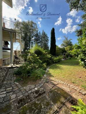 Sehr gepflegtes 2-Familienhaus mit Gartenparadies + Garage